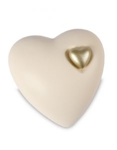 Urna cineraria in ceramica beige con cuore d'oro