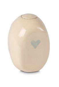 Mini urna cineraria in ceramica beige con cuore